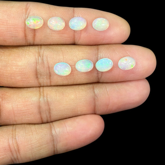 Natural White Ethiopian Opal Stone 25.43 Carats Oval Cabochon Shape 8 x 6 mm