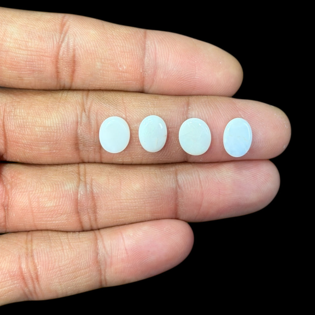 Natural White Ethiopian Opal Stone 25.76 Carats Oval Cabochon Shape 10 x 8 mm