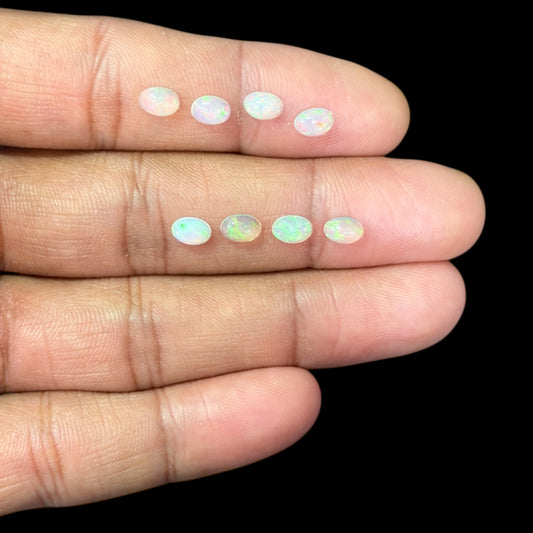 Natural White Ethiopian Opal Stone 25.91 Carats Oval Cabochon Shape 6 x 4 mm