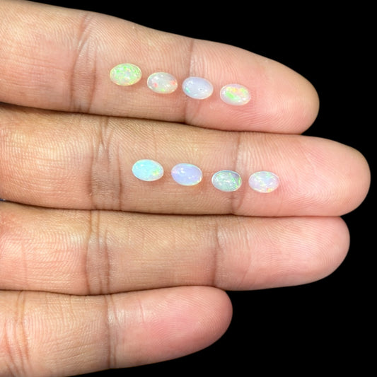 Natural White Ethiopian Opal Stone 26.61 Carats Oval Cabochon Shape 6 x 4 mm