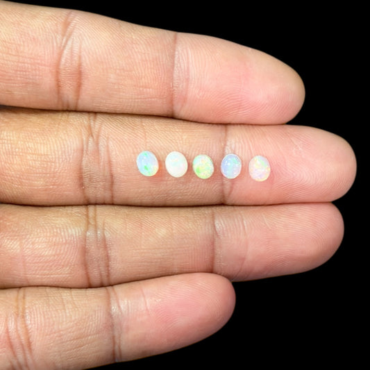 Natural White Ethiopian Opal Stone 27.63 Carats Oval Cabochon Shape 5 x 4 mm