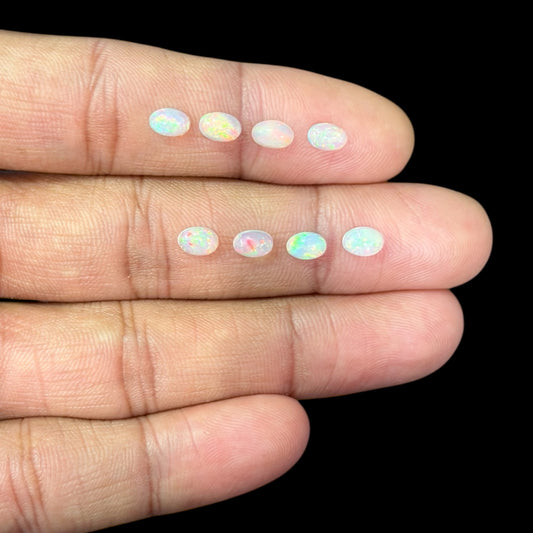 Natural White Ethiopian Opal Stone 27.85 Carats Oval Cabochon Shape 6 x 4 mm