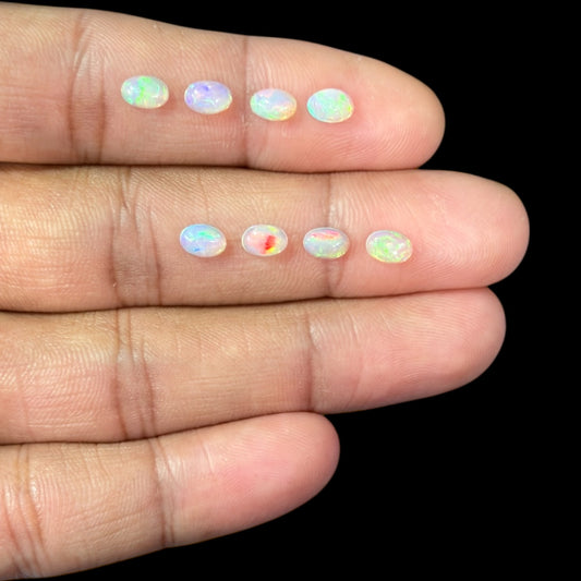 Natural White Ethiopian Opal Stone 28.55 Carats Oval Cabochon Shape 6 x 4 mm