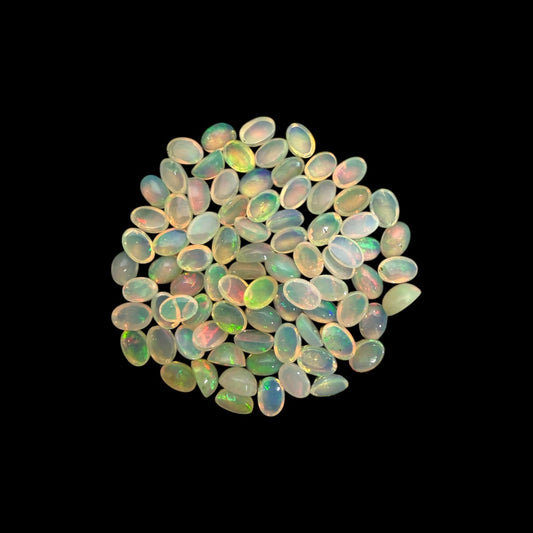 Natural White Ethiopian Opal Stone 28.55 Carats Oval Cabochon Shape 6 x 4 mm