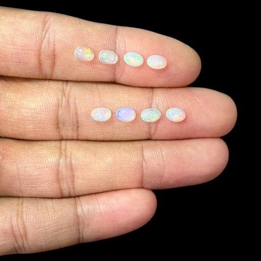 Natural White Ethiopian Opal Stone 28.68 Carats Oval Cabochon Shape 6 x 4 mm