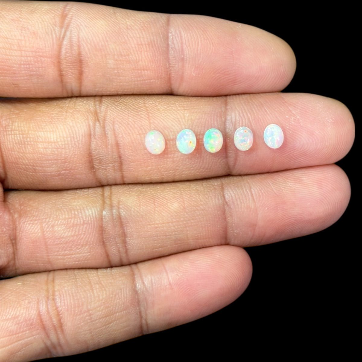 Natural White Ethiopian Opal Stone 28.74 Carats Oval Cabochon Shape 5 x 4 mm