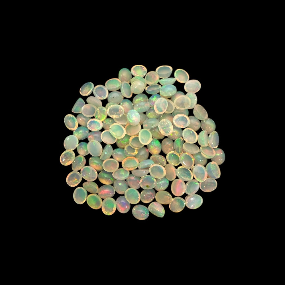 Natural White Ethiopian Opal Stone 28.74 Carats Oval Cabochon Shape 5 x 4 mm