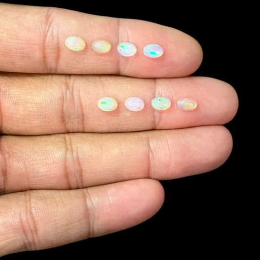 Natural White Ethiopian Opal Stone 28.81 Carats Oval Cabochon Shape 6 x 4 mm