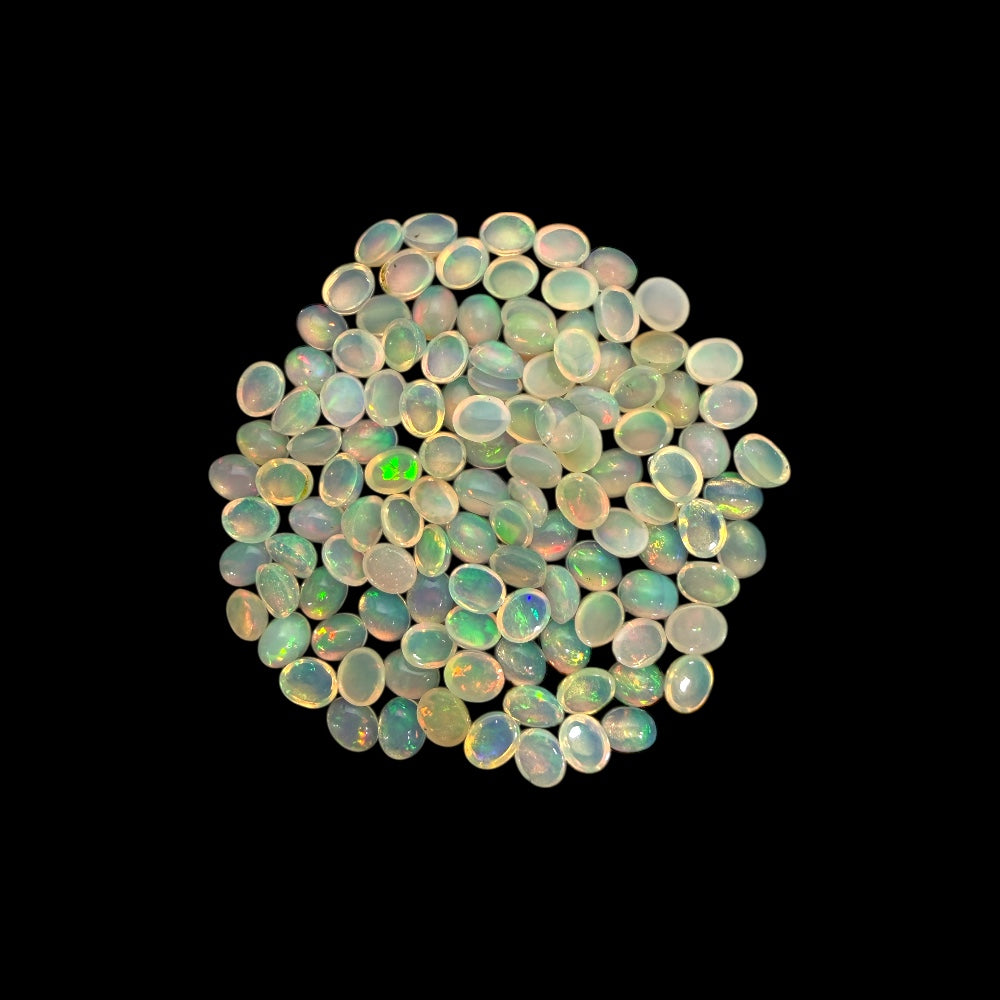 Natural White Ethiopian Opal Stone 28.94 Carats Oval Cabochon Shape 5 x 4 mm