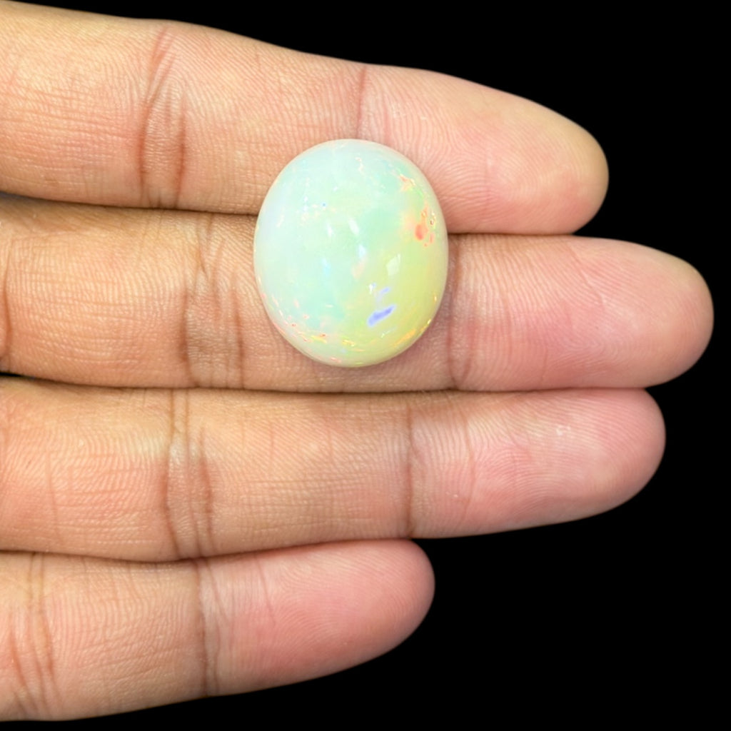 Natural White Ethiopian Opal Stone 29.37 Carats Oval Cabochon Shape 23.4 x 20.2 x 11.9 mm