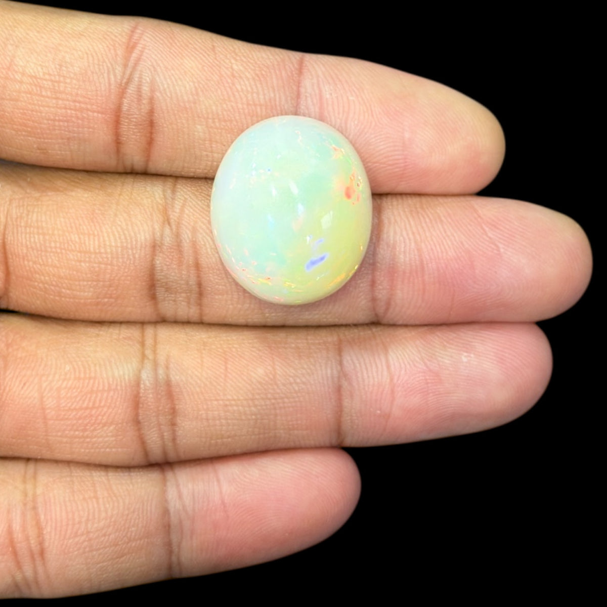 Natural White Ethiopian Opal Stone 29.37 Carats Oval Cabochon Shape 23.4 x 20.2 x 11.9 mm