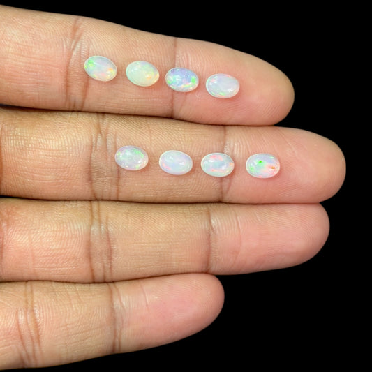 Natural White Ethiopian Opal Stone 29.61 Carats Oval Cabochon Shape 7 x 5 mm