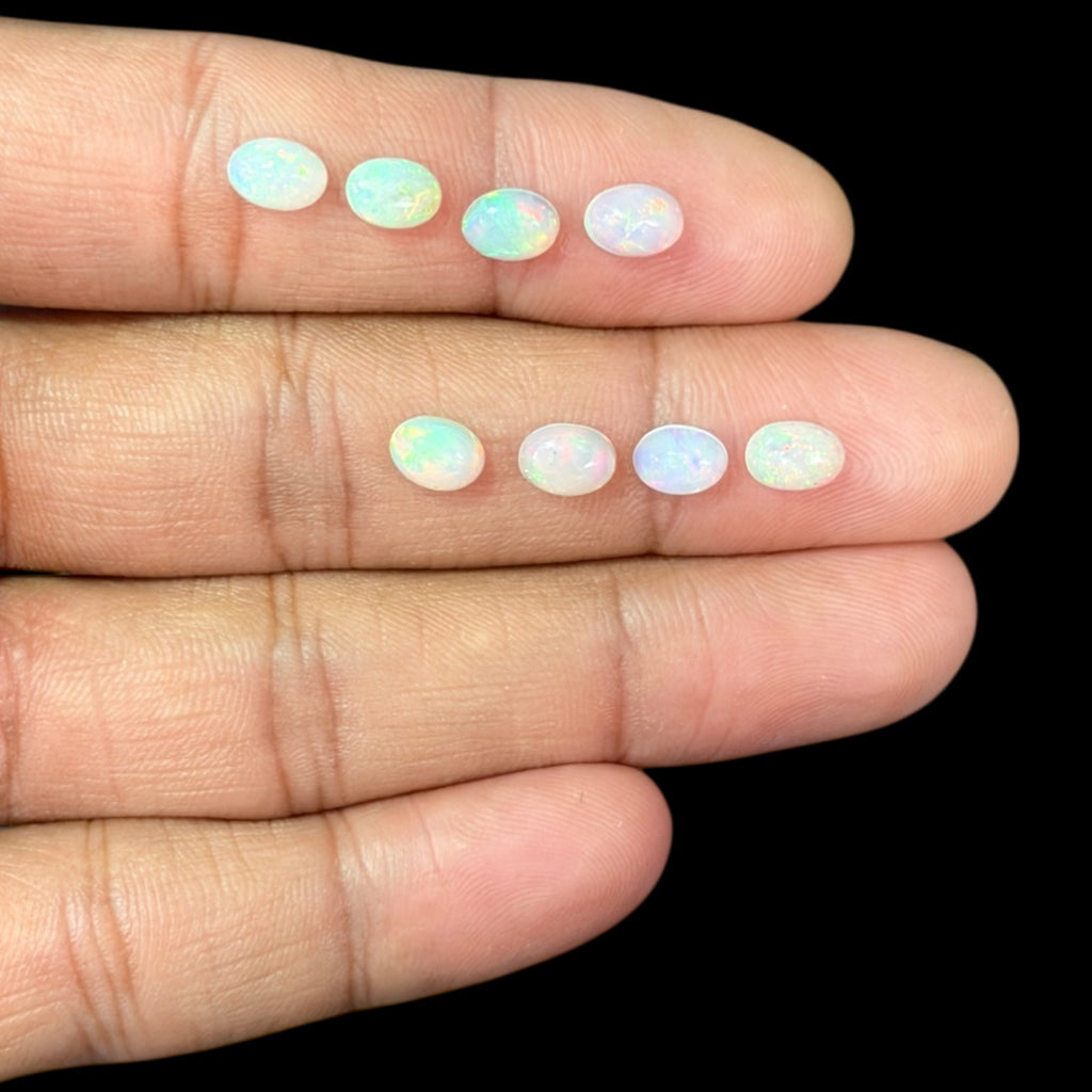 Natural White Ethiopian Opal Stone 30.18 Carats Oval Cabochon Shape 7 x 5 mm