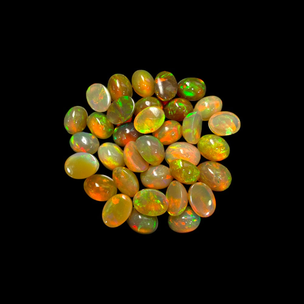 Natural White Ethiopian Opal Stone 33.25 Carats Oval Cabochon Shape 8 x 6 mm  