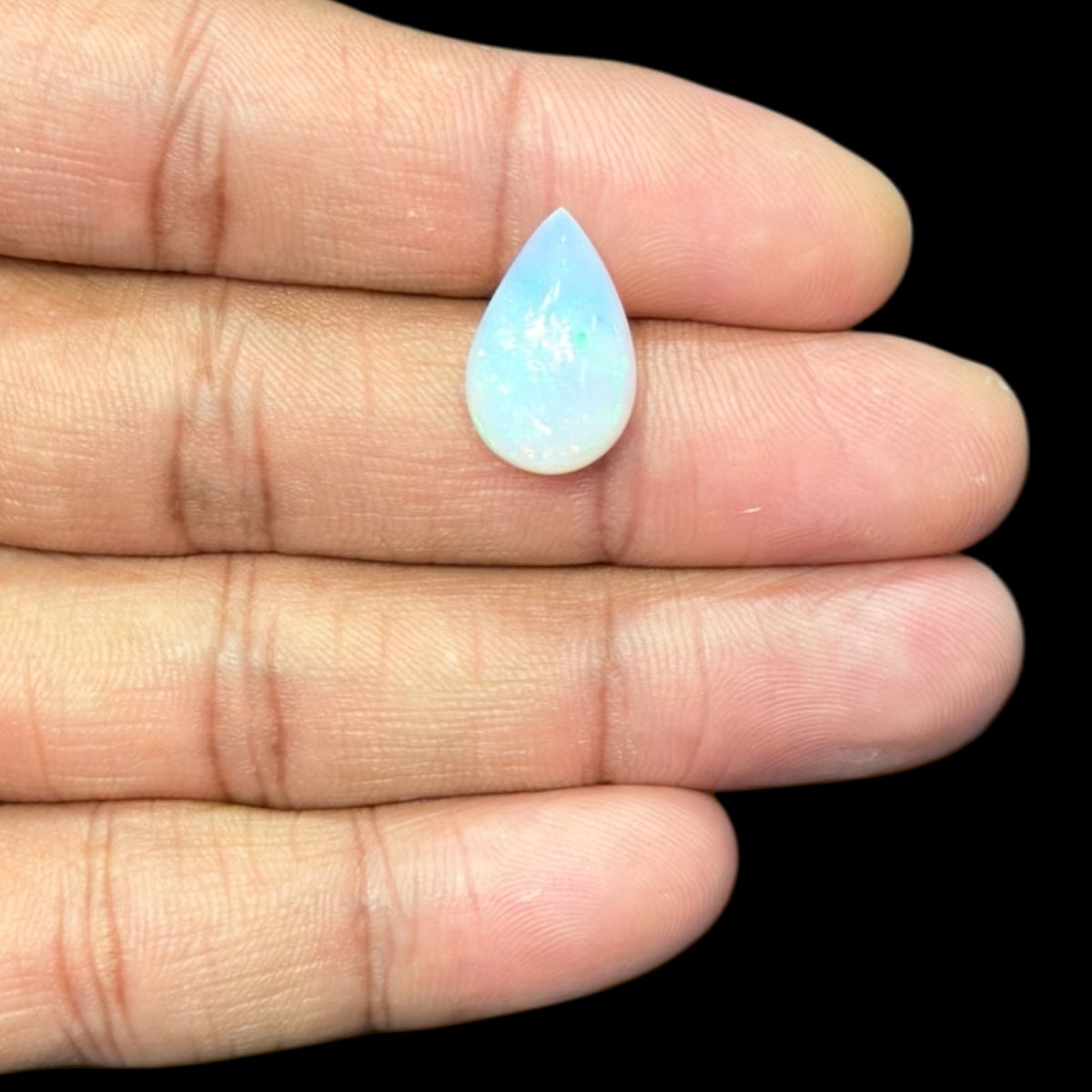 Natural White Ethiopian Opal Stone 6.16 Carats Pear Cabochon Shape 17.2 x 11 x 6.8 mm