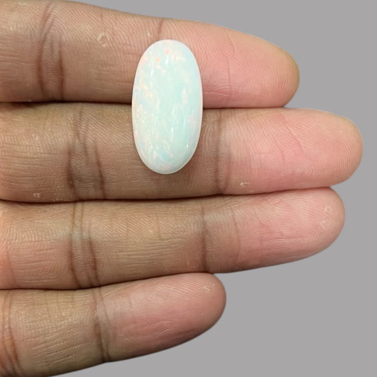 Natural White Ethiopian Opal Stone 9.53  Carats Oval Cabochon Shape 24.4 x 12.9 x 6.1 mm