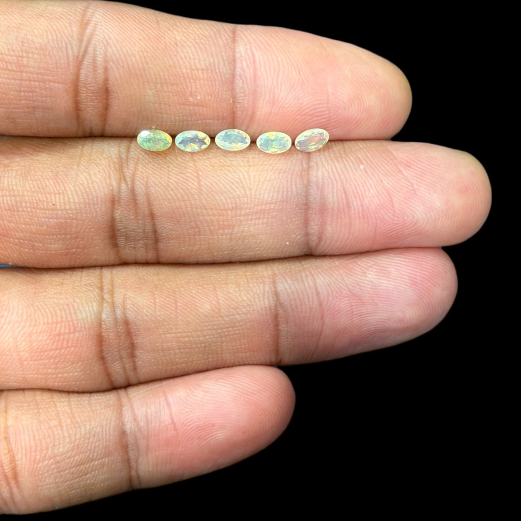 Natural White Ethiopian Opal Stone 9.61 Carats Oval Cabochon Shape 5 x 3 mm