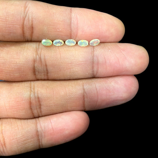 Natural White Ethiopian Opal Stone 9.61 Carats Oval Cabochon Shape 5 x 3 mm