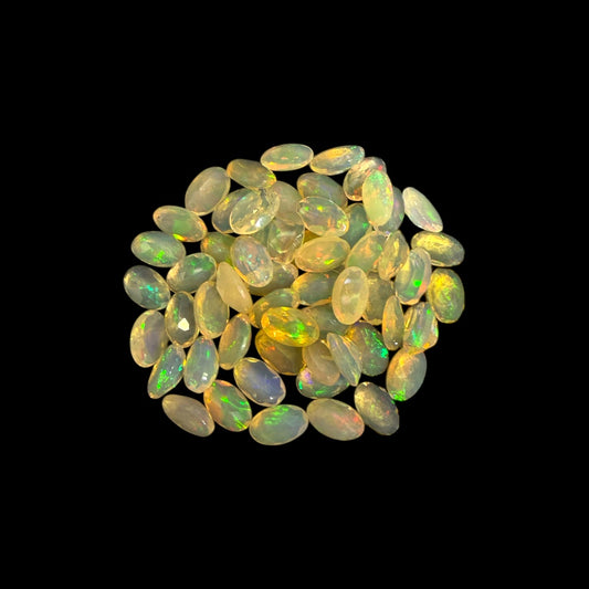 Natural White Ethiopian Opal Stone 9.75 Carats Oval Cabochon Shape 5 x 3 mm