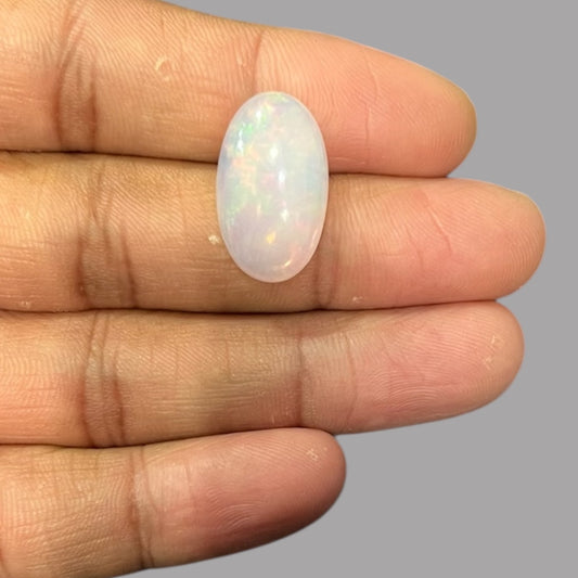 Natural White Ethiopian Opal Stone 9.98 Carats Oval Cabochon Shape 21.5 x 12.8 x 6.7 mm