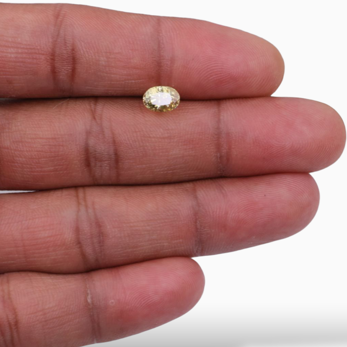 Buy Natural Yellow Sapphire (Pukraj Stone) In Oval Shape 2.09 Carats 7.7x5.5mm Size