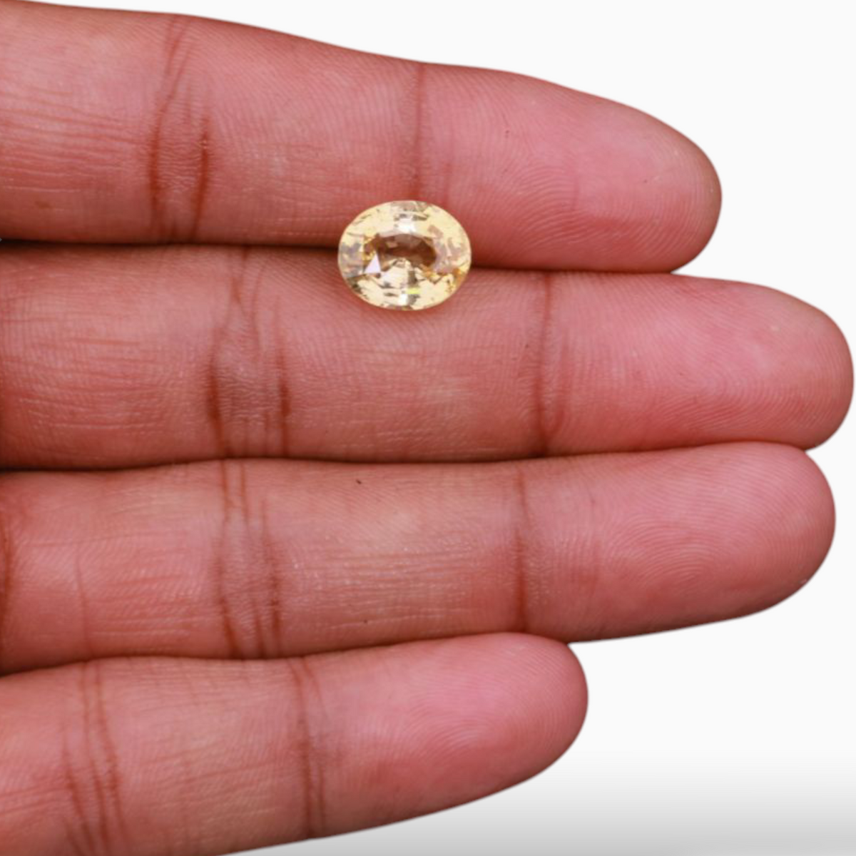 Natural Yellow Sapphire 5.55 Carats in Oval Shape & 11.20x9.32x6.02mm Size from Srilanka