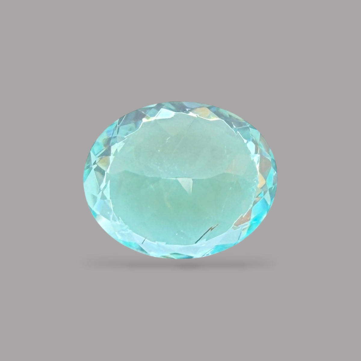 Paraiba Tourmaline Oval Cut 0.79 Carats 6.43 x 5.26 × 3.71 mm From Mozambique GIA Certified