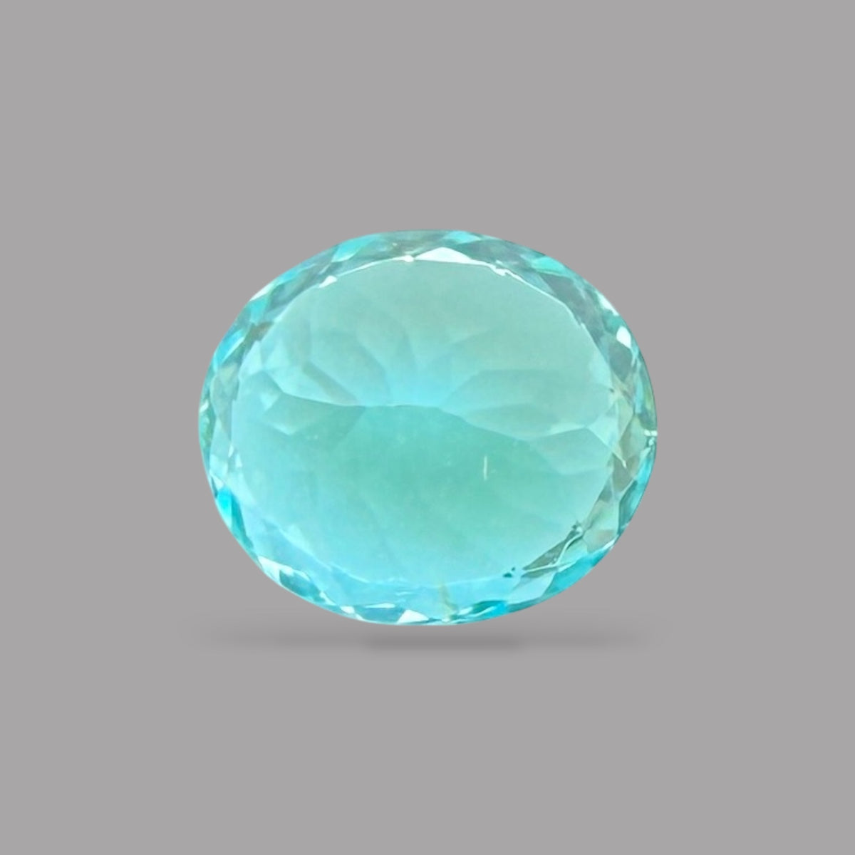 Paraiba Tourmaline Oval Cut 1.02 Carats 6.55 x 5.68 x 4.47 mm From Mozambique GIA Certified