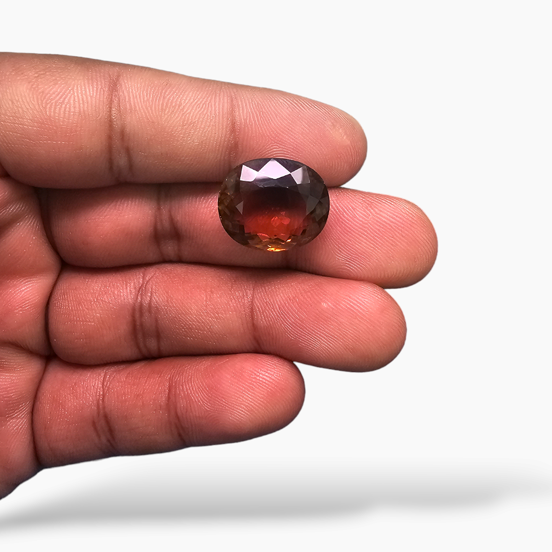 Natural Orange Tourmaline Stone 15.49 Carats Oval Shape (17.08 x 14.57 x 8.57 mm)