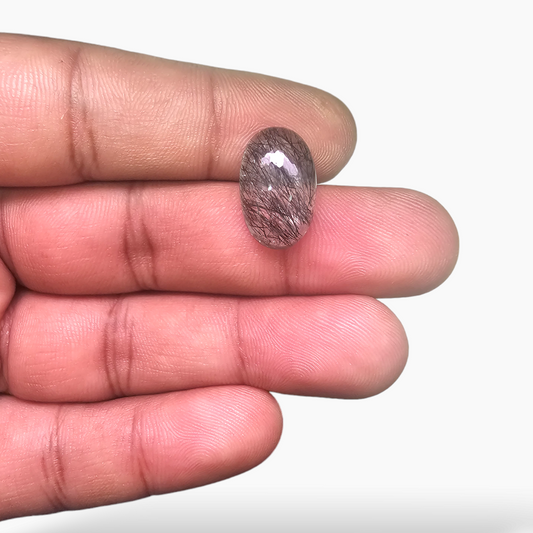 for sale Natural Black Rutile Quartz Stone 8.22 Carats Oval Cabochon Shape ( 17X10.5 mm )