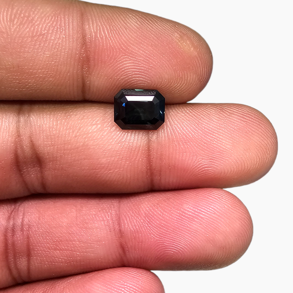 Green Sapphire: 2.74 Carat Emerald Cut - $800/ct, African Origin