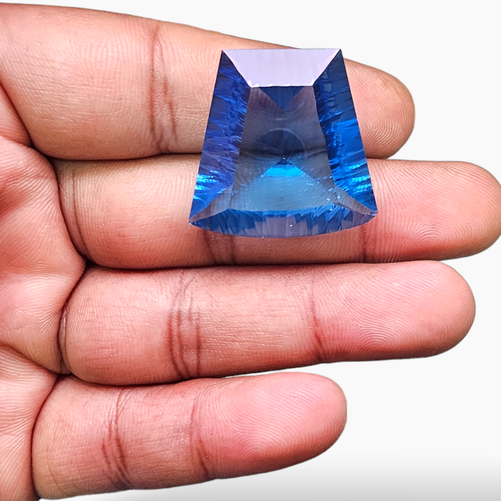 Natural Blue Topaz Gemstone in Fancy Shape with 56 Carats Weight for Sale