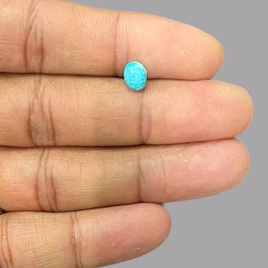 Raw Turquoise Stone 0.58 Carats 7.3 x 5.5 x 3 mm in oval