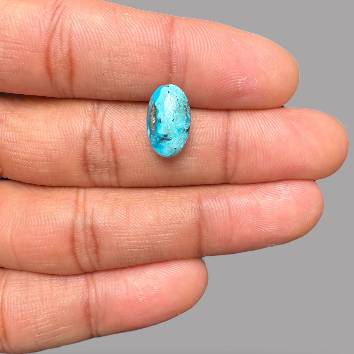 Raw Turquoise Stone 4.44 Carats 14 x 8.3 x 4.8 mm in Oval