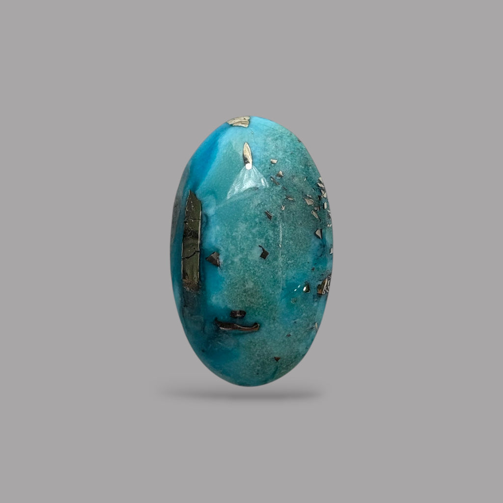 Raw Turquoise Stone 4.44 Carats 14 x 8.3 x 4.8 mm in Oval