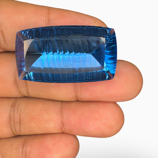 Swiss Blue Topaz Cushion Shape 64.70 Carats Stone Size 32X19mm