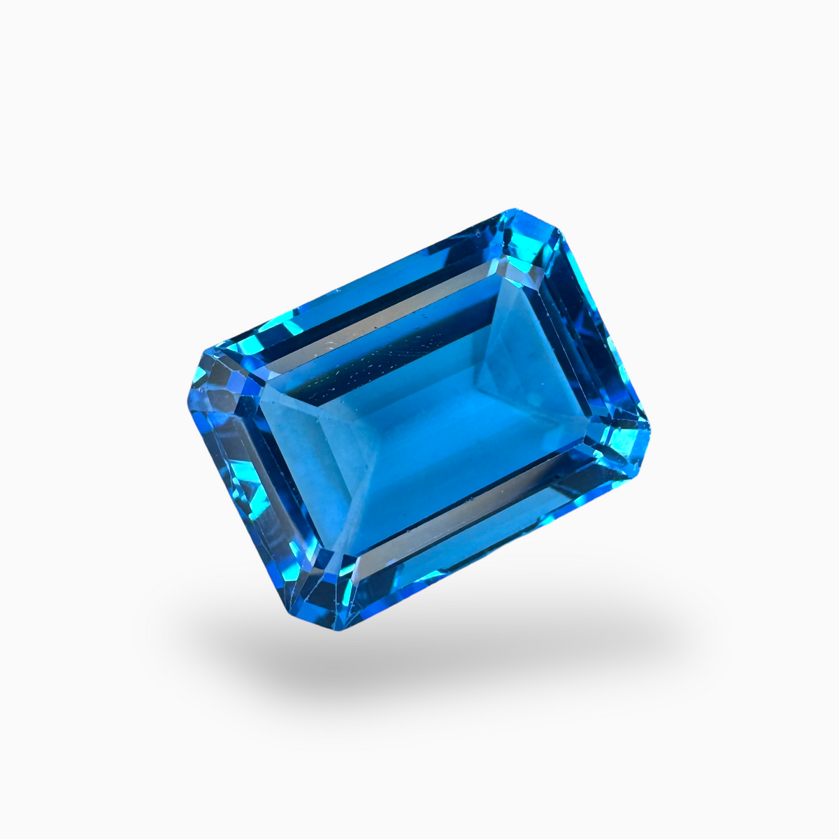 Swiss Blue Topaz Emerald Cut Shape 16.50 Carats Stone Size 16X12mm