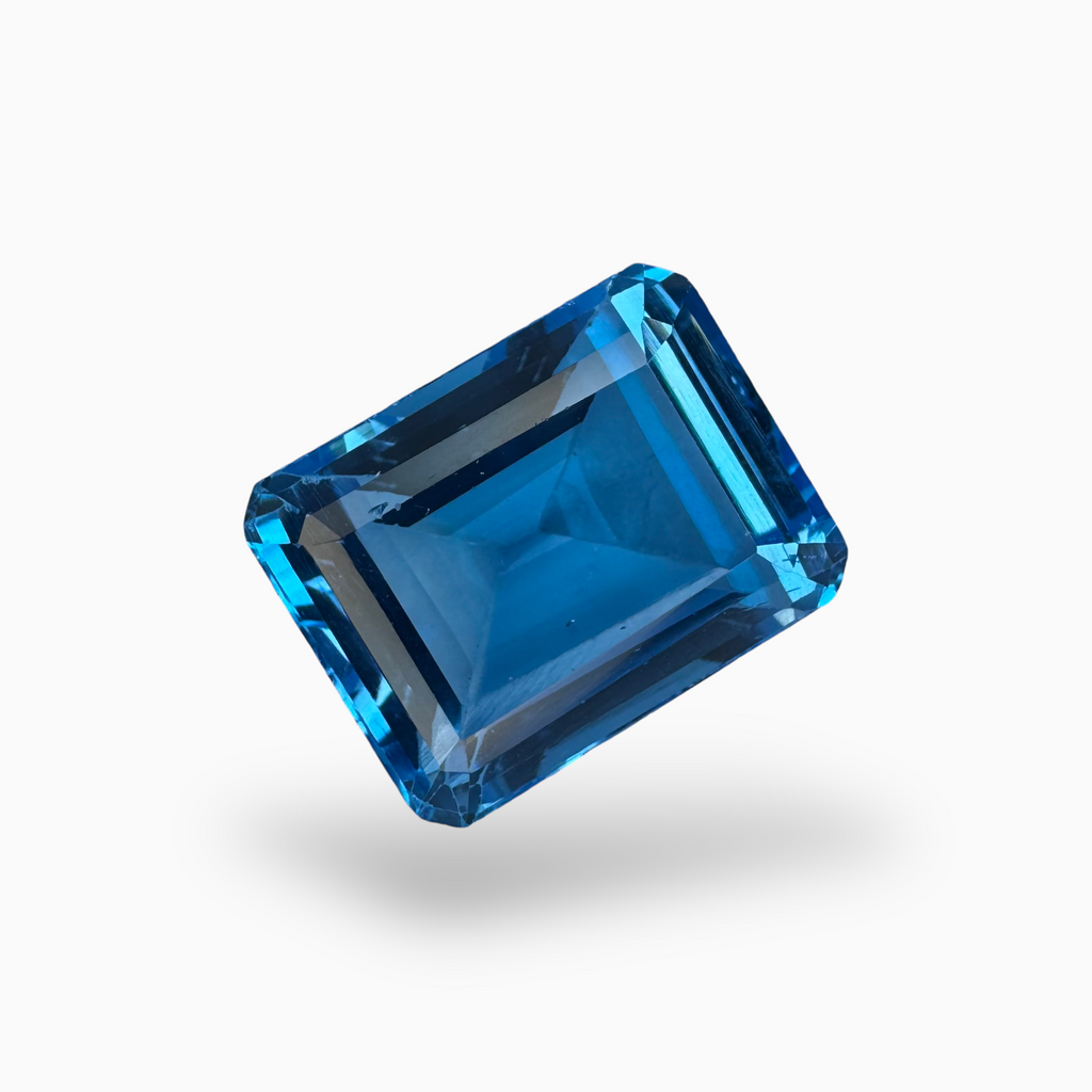 Buy Swiss Blue Topaz Emerald Cut Shape 18.68 Carats Stone Size 16X13mm