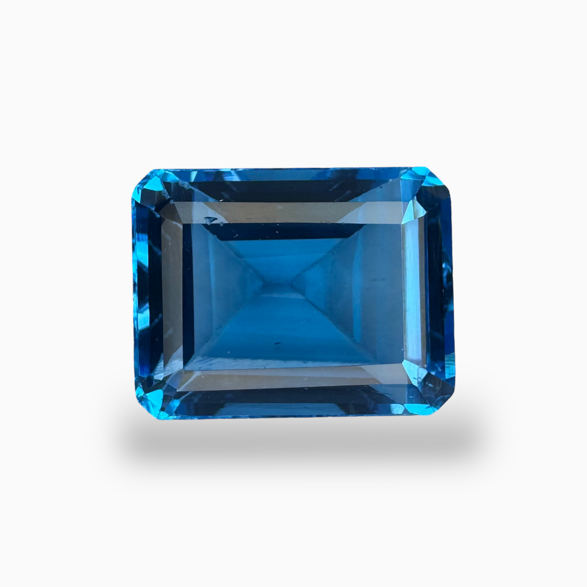 Buy Swiss Blue Topaz Emerald Cut Shape 18.68 Carats Stone Size 16X13mm
