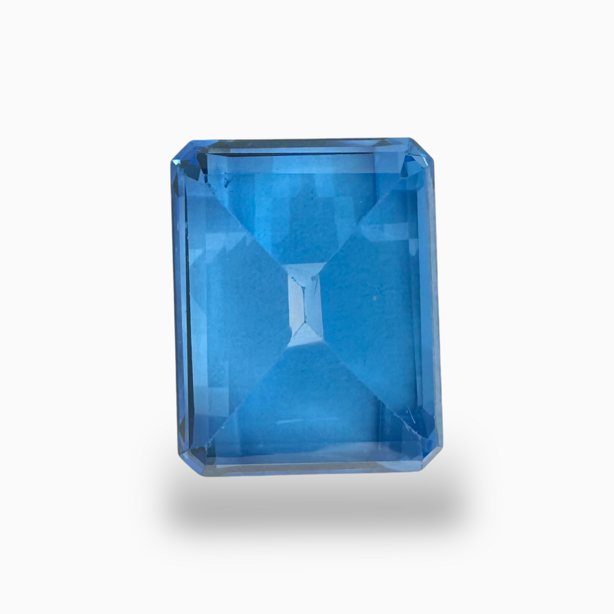 Buy Swiss Blue Topaz Emerald Cut Shape 18.68 Carats Stone Size 16X13mm