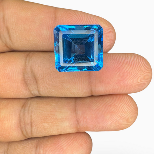 Swiss Blue Topaz Emerald Cut Shape 21.60 Carats Stone Size 14.5X13.5mm