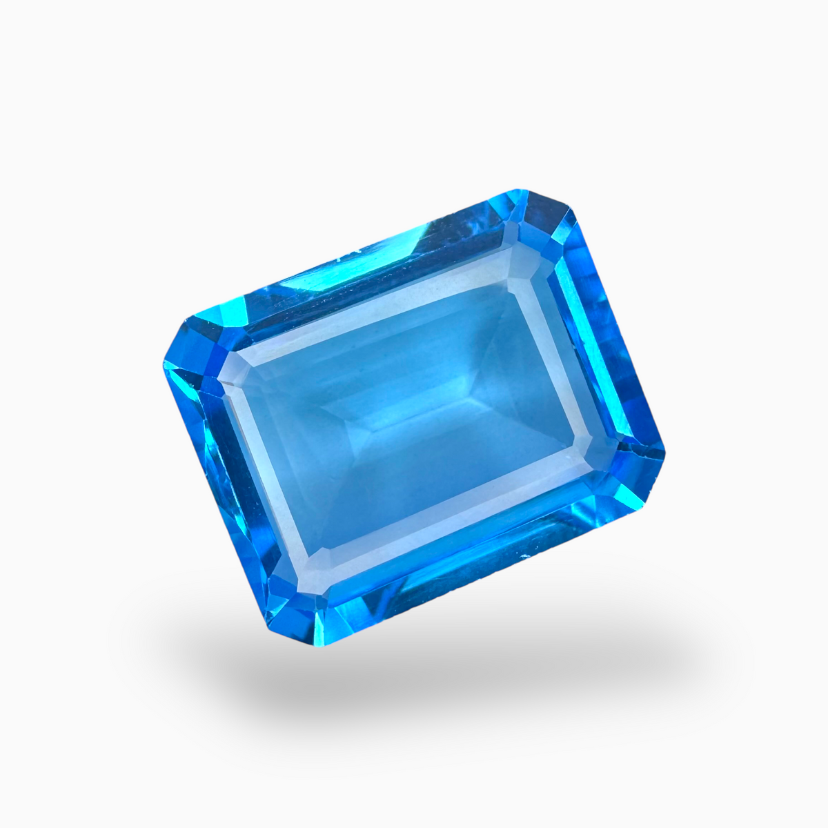 Swiss Blue Topaz Emerald Cut Shape 29.20 Carats Stone Size 20.5X16.5mm