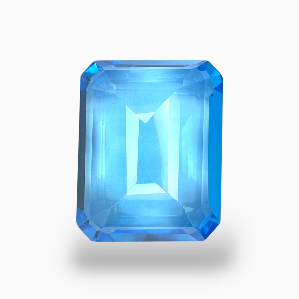 Swiss Blue Topaz Emerald Cut Shape 29.20 Carats Stone Size 20.5X16.5mm