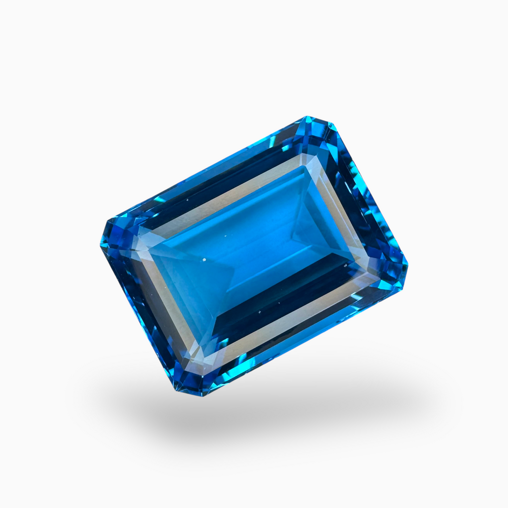 Deep Swiss Blue Topaz Emerald Cut Shape 38.80 Carats Stone Size 21X16mm