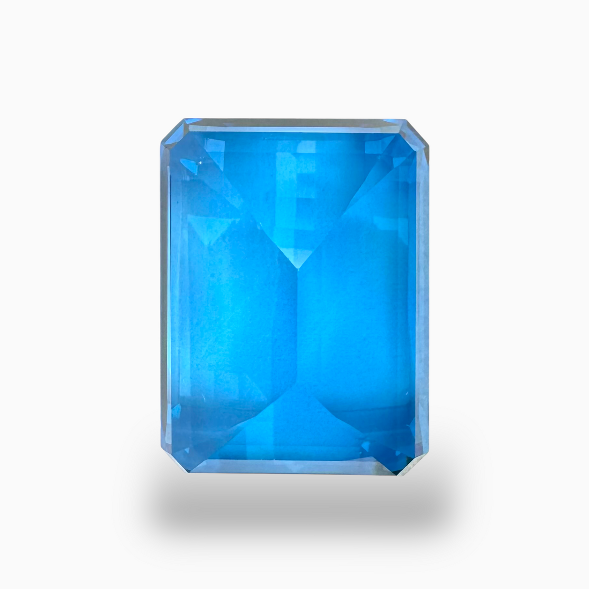 Deep Swiss Blue Topaz Emerald Cut Shape 38.80 Carats Stone Size 21X16mm