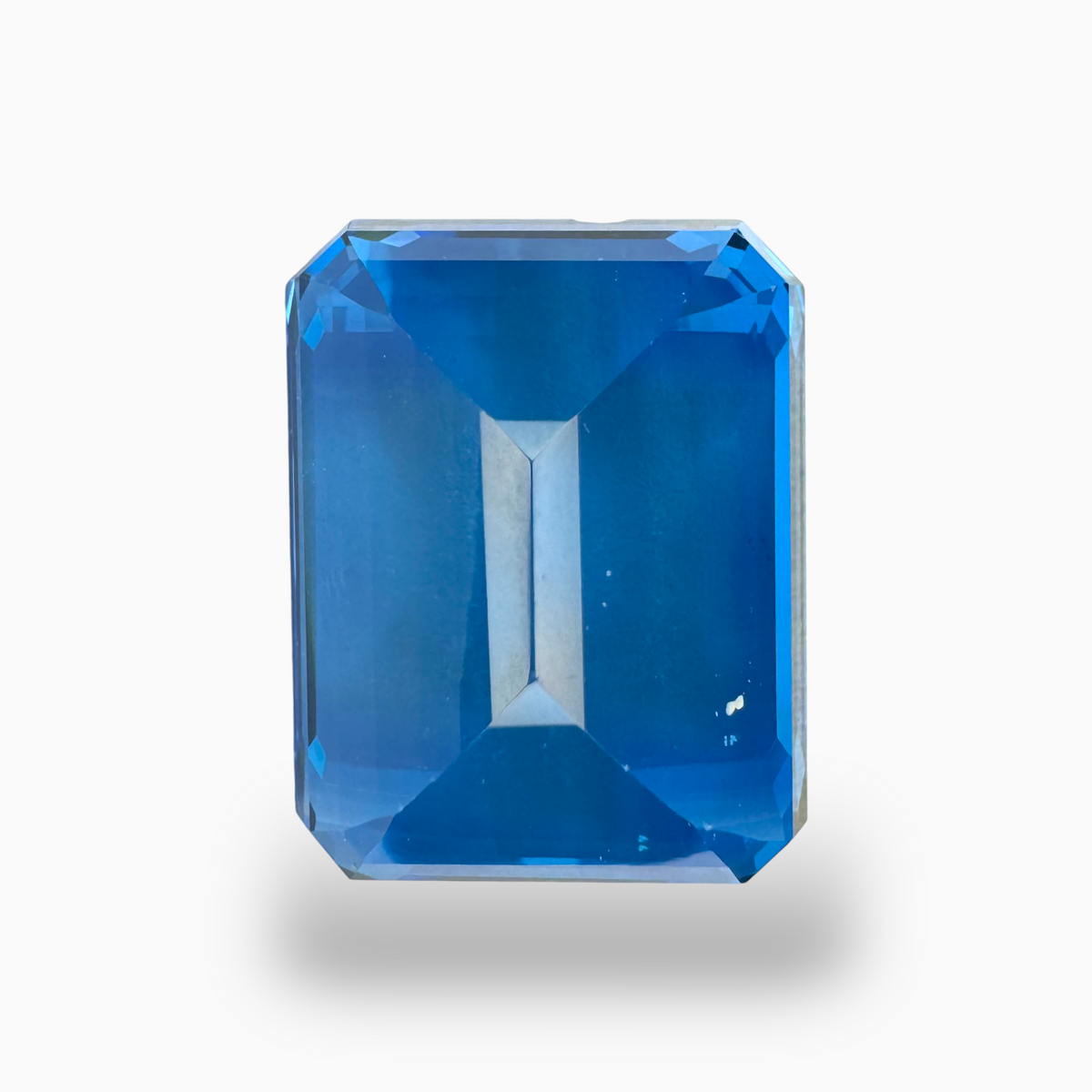 Deep Swiss Blue Topaz Emerald Cut Shape 48.88 Carats Stone Size 22.5X17mm