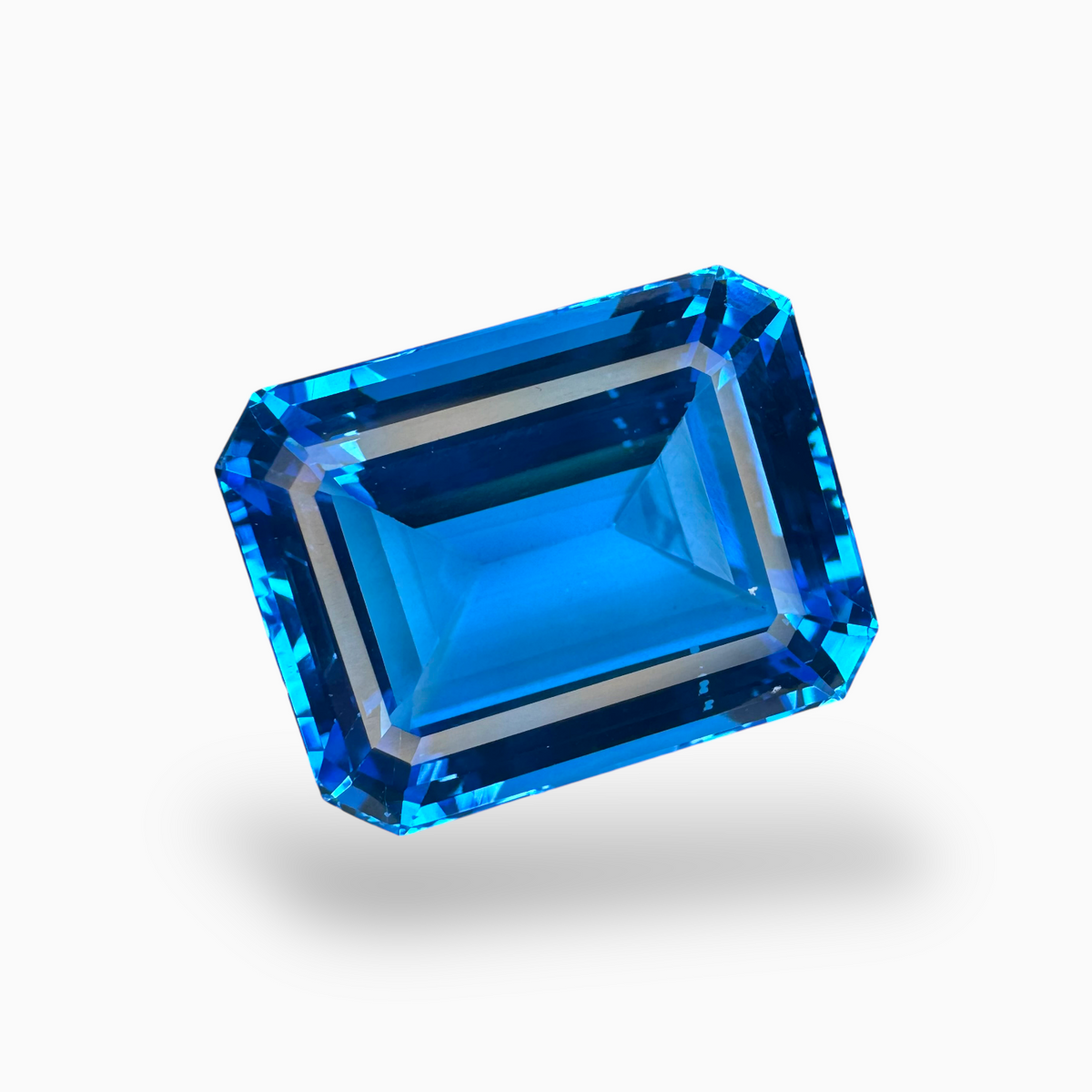 Deep Swiss Blue Topaz Emerald Cut Shape 48.88 Carats Stone Size 22.5X17mm