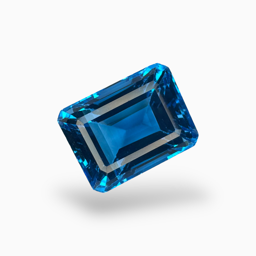 Swiss Blue Topaz Emerald Cut Shape 22.55 Carats Stone Size 16X12mm