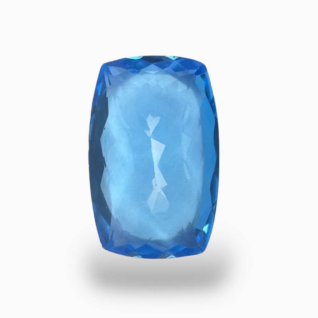 Buy Swiss Blue Topaz Long Cushion Shape 21.36 Carats Stone Size 22X14mm