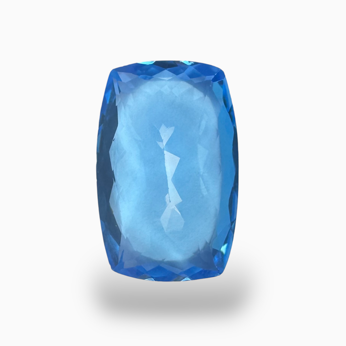 Buy Swiss Blue Topaz Long Cushion Shape 21.36 Carats Stone Size 22X14mm